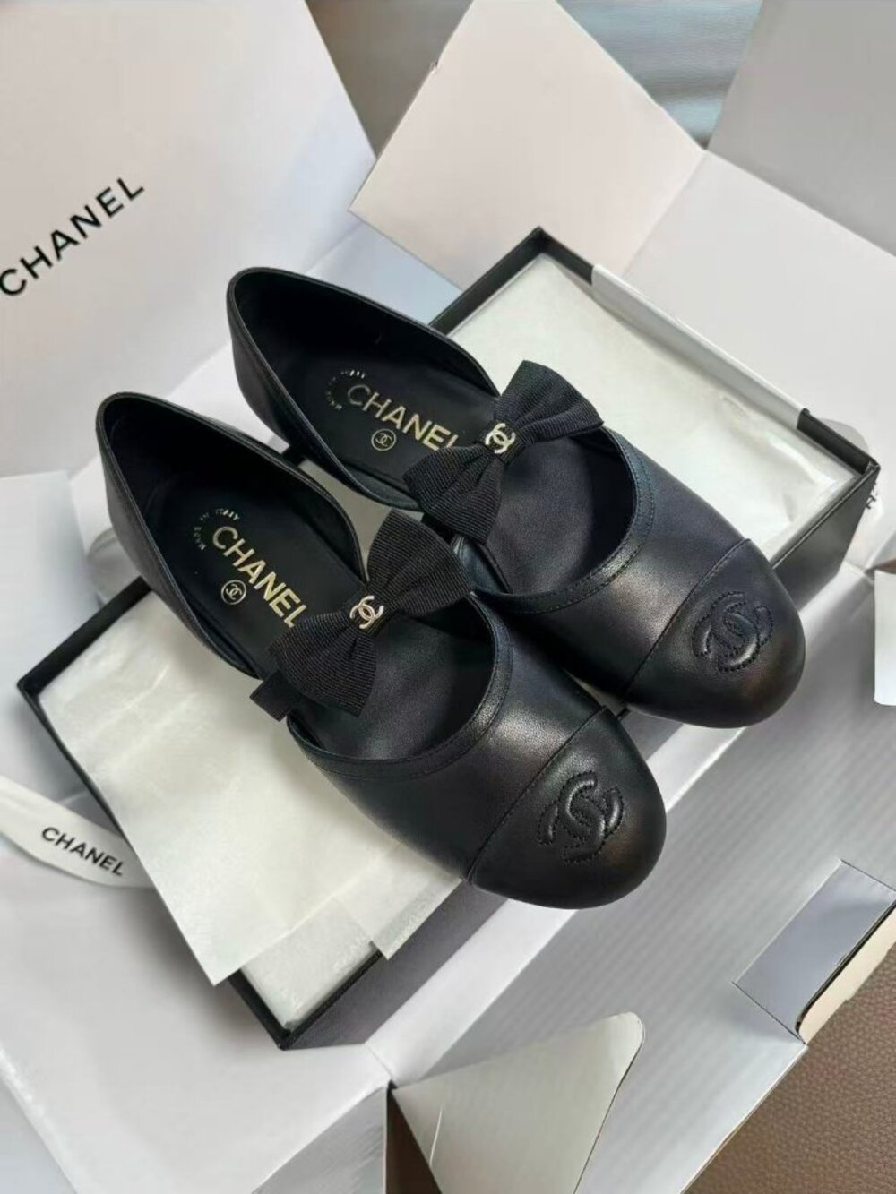 Chanel Women’s Black Leather Mary‑Jane Flat Shoes Bow CC Logo Details